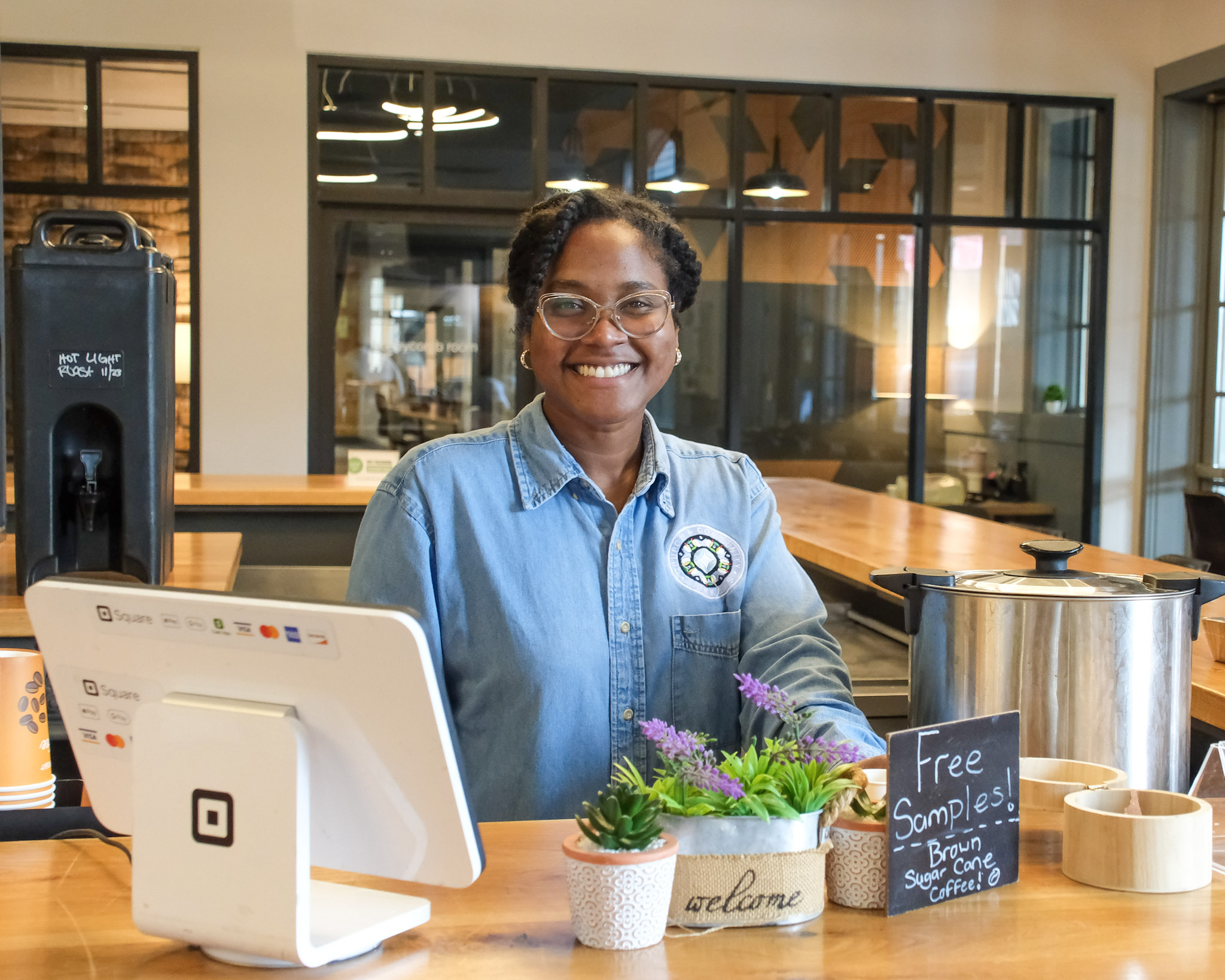 black woman business owner of a coffee. company from Columbia